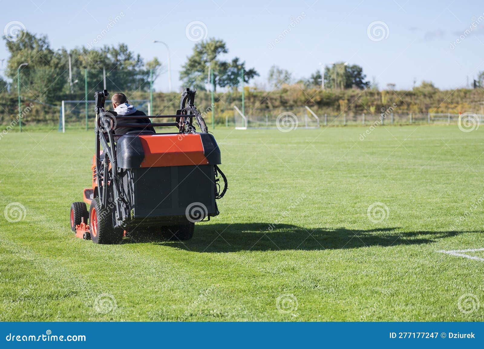 Mowing grass stock image. Image of football, groundsman 277177247