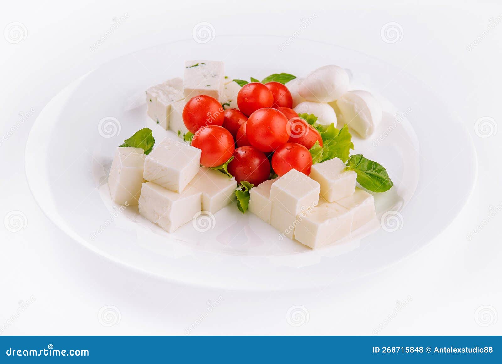 Mozzarella Cheese with Cherry Tomatoes and Goat Cheese Stock Photo