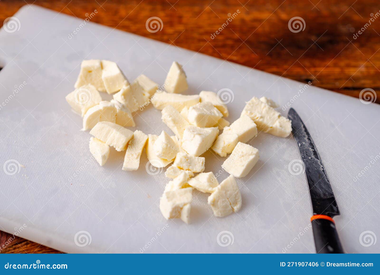 Mozzarella Cheese Diced on White Cutting Board Stock Photo Image of