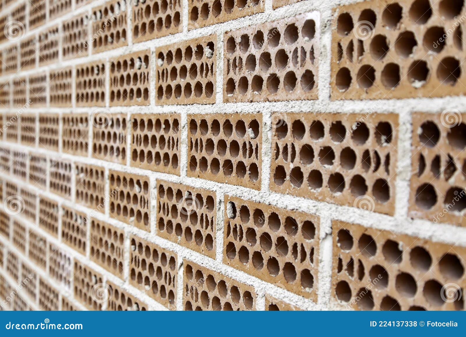 Brick wall with holes stock photo. Image of clay, grunge 224137338