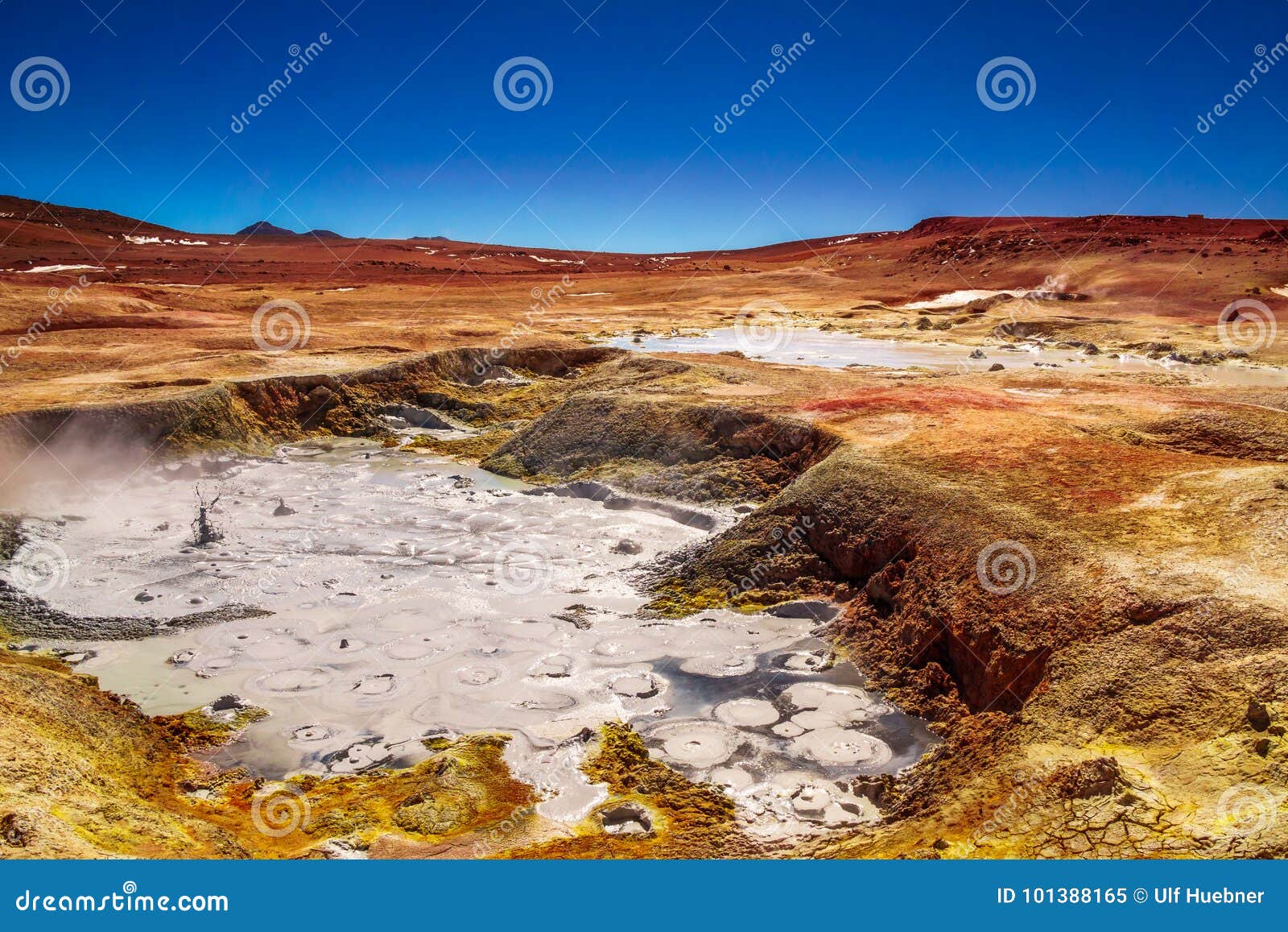 mud pool by geyser sol de la manana in the altiplano of bolivia