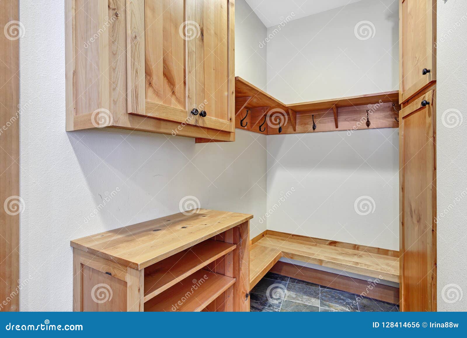 Mud Room With Stone Tile Floor And Bench Stock Photo Image Of