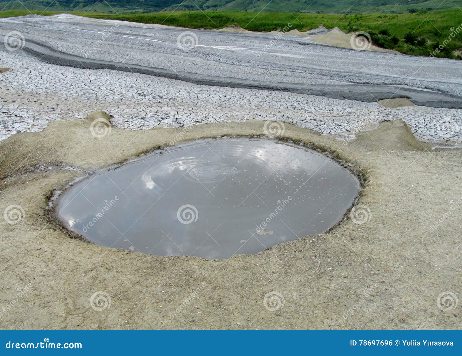 mud volcano dirt lake in buzau, romania