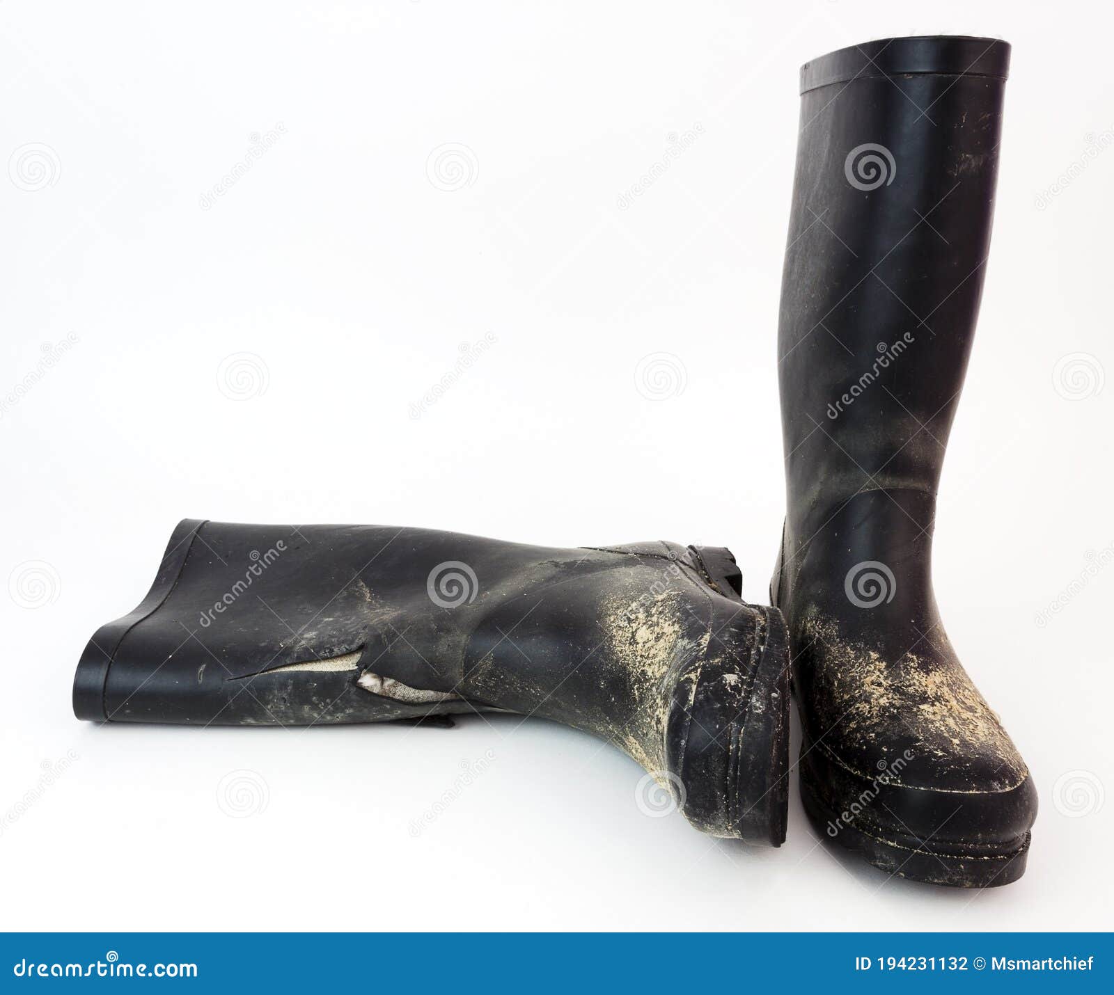 Muddy rubber boots. stock photo. Image of dirt, rubber 194231132