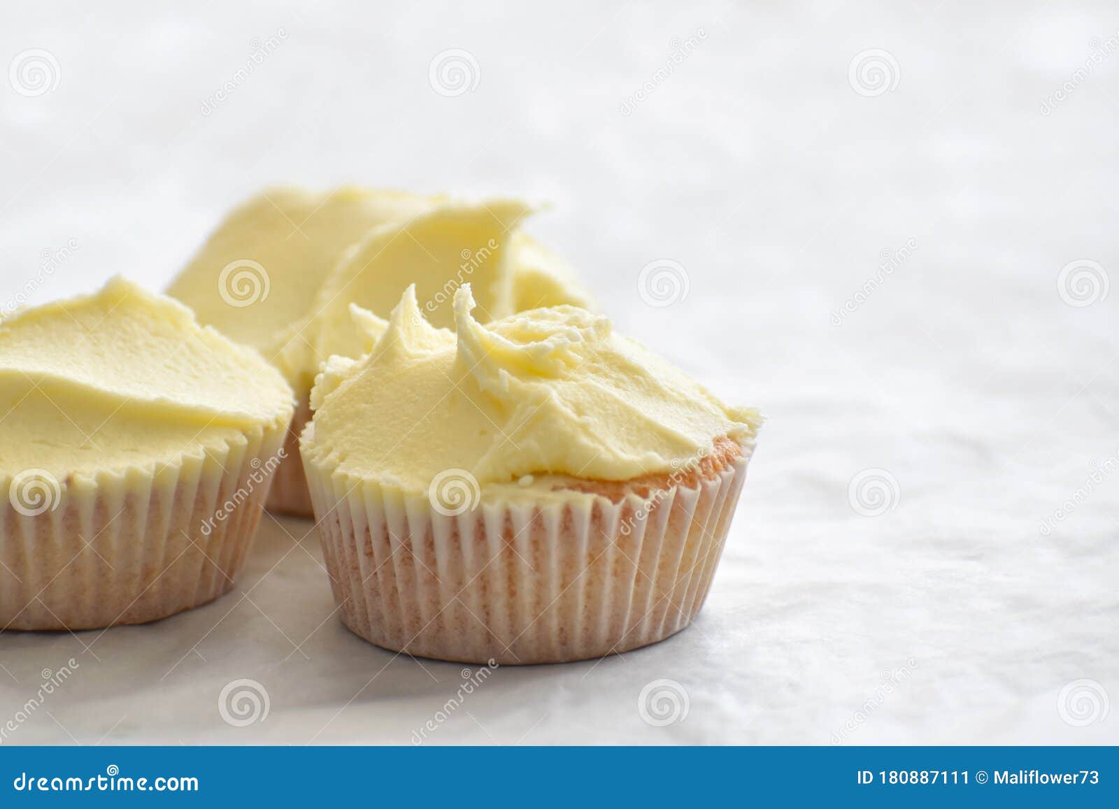 Muffin on Parchment Paper with Copy Space on the Right Side. Stock