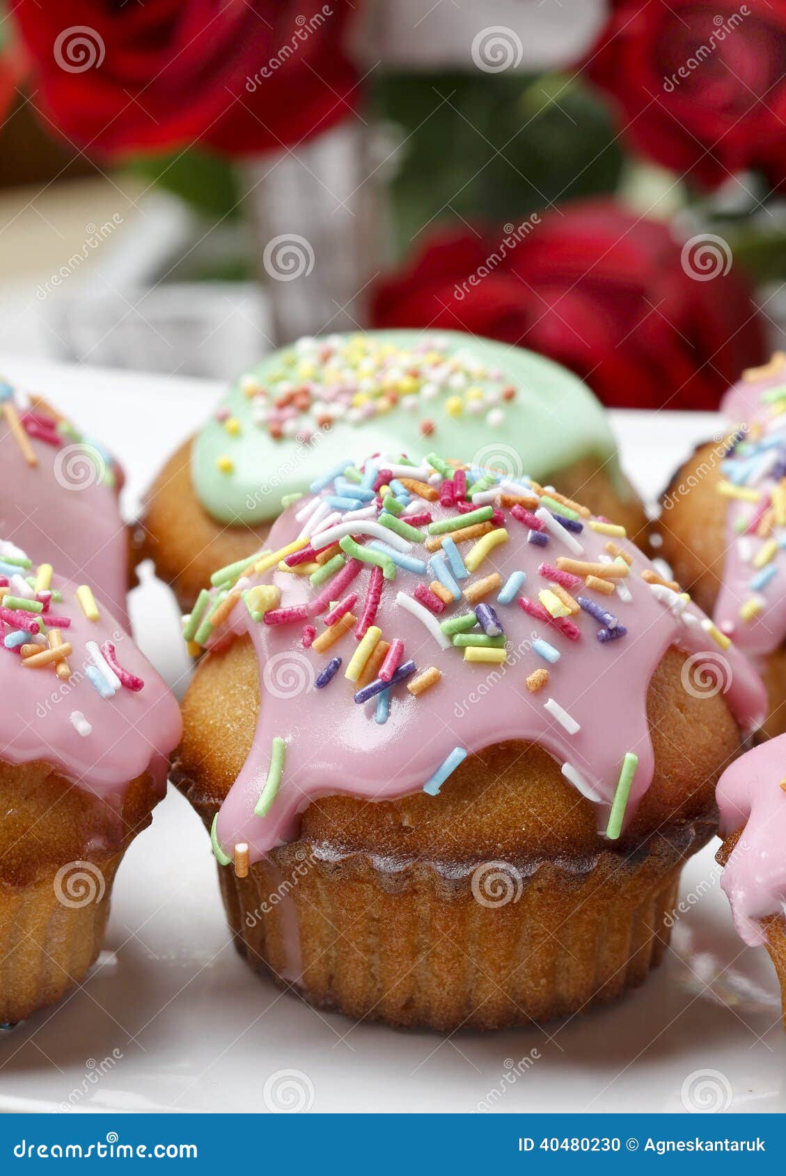 Muffins With Pink Icing And Colorful Sprinkles Stock Photo - Image of ...