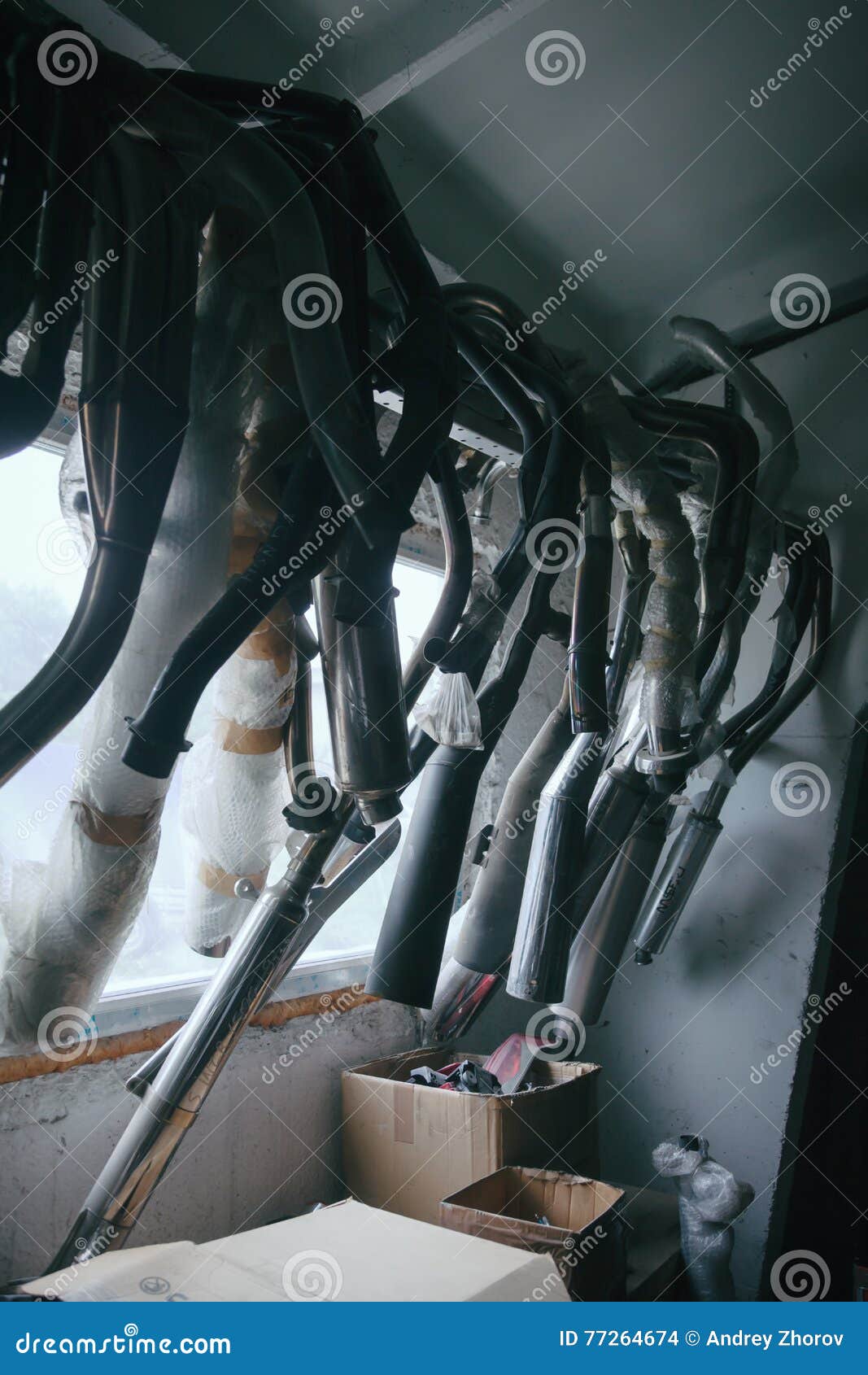 Mufflers Hanging Against Window Stock Photos Free & RoyaltyFree