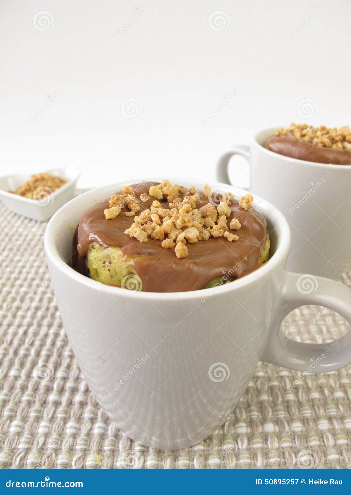 Mug Cake with Chocolate Icing and Almond Brittle Stock Image Image of