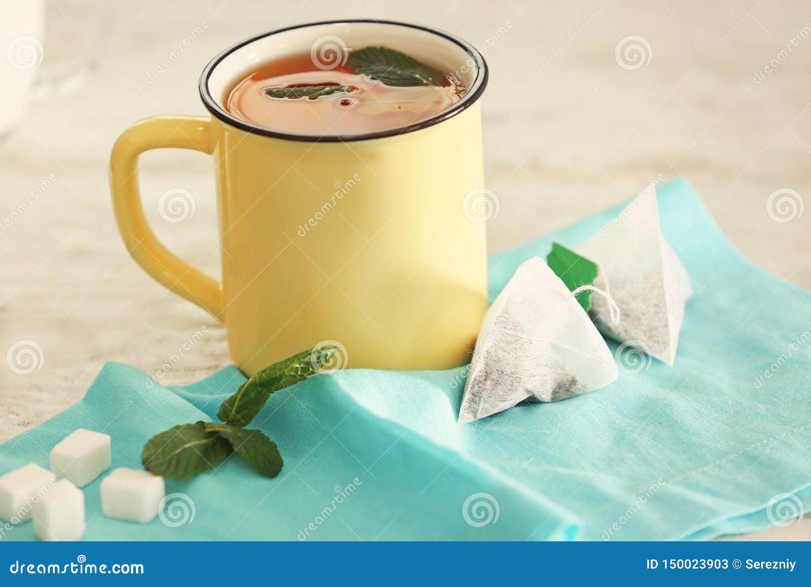 Mug of Hot Beverage and Tea Bags on Table Stock Image Image of table