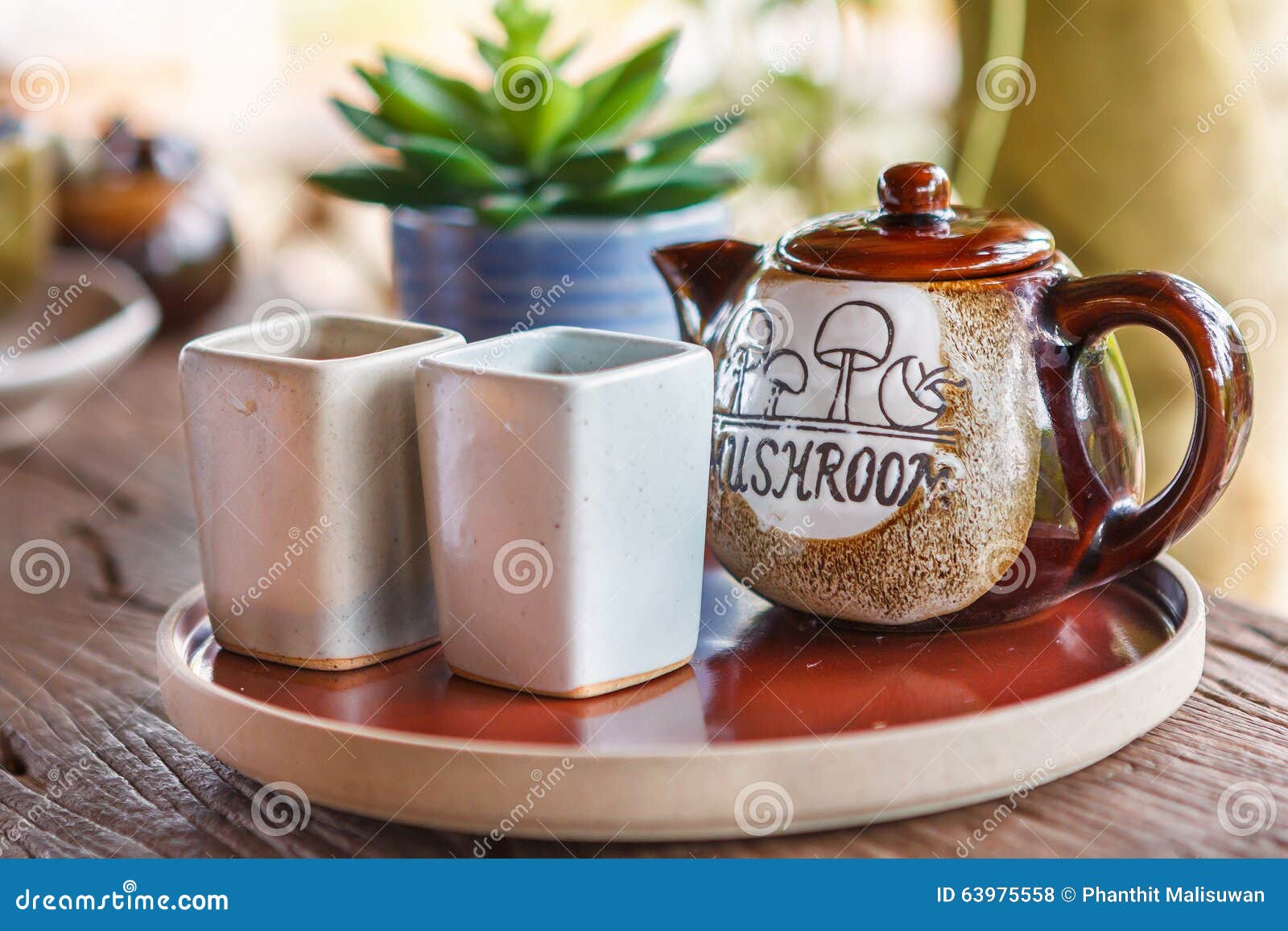 Mug and a Jug in Plate on a Wooden Table Stock Photo - Image of fresh ...
