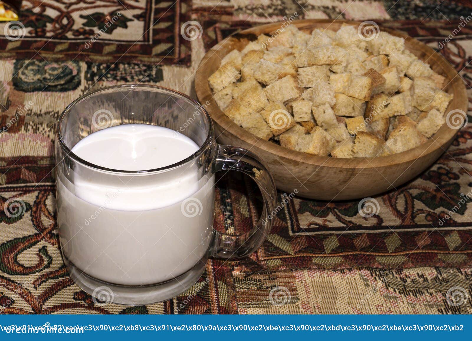 Mug With A Sour Milk Drink And A Wooden Bowl With Rusks Stock