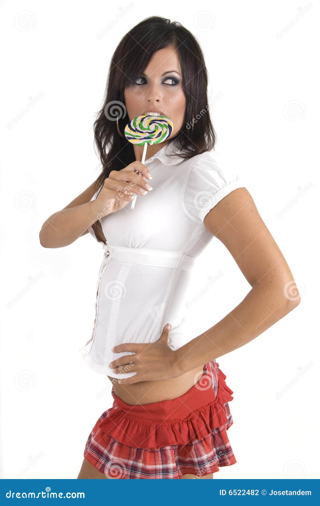 Mujer Con Ropa Y El Lollipop De La Escuela Foto de archivo de cuidado: 6522482
