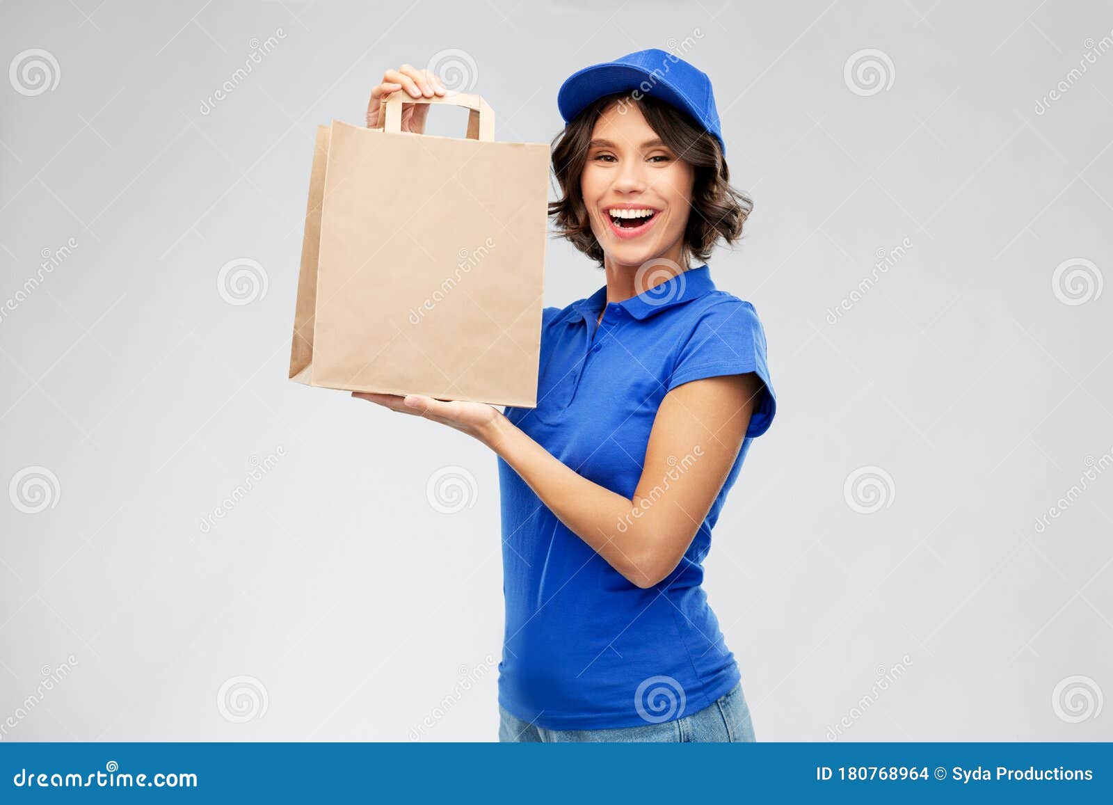 Mujer De Parto Con Comida Para Llevar En Bolsa De Papel Foto de archivo -  Imagen de adulto, hembra: 180768964