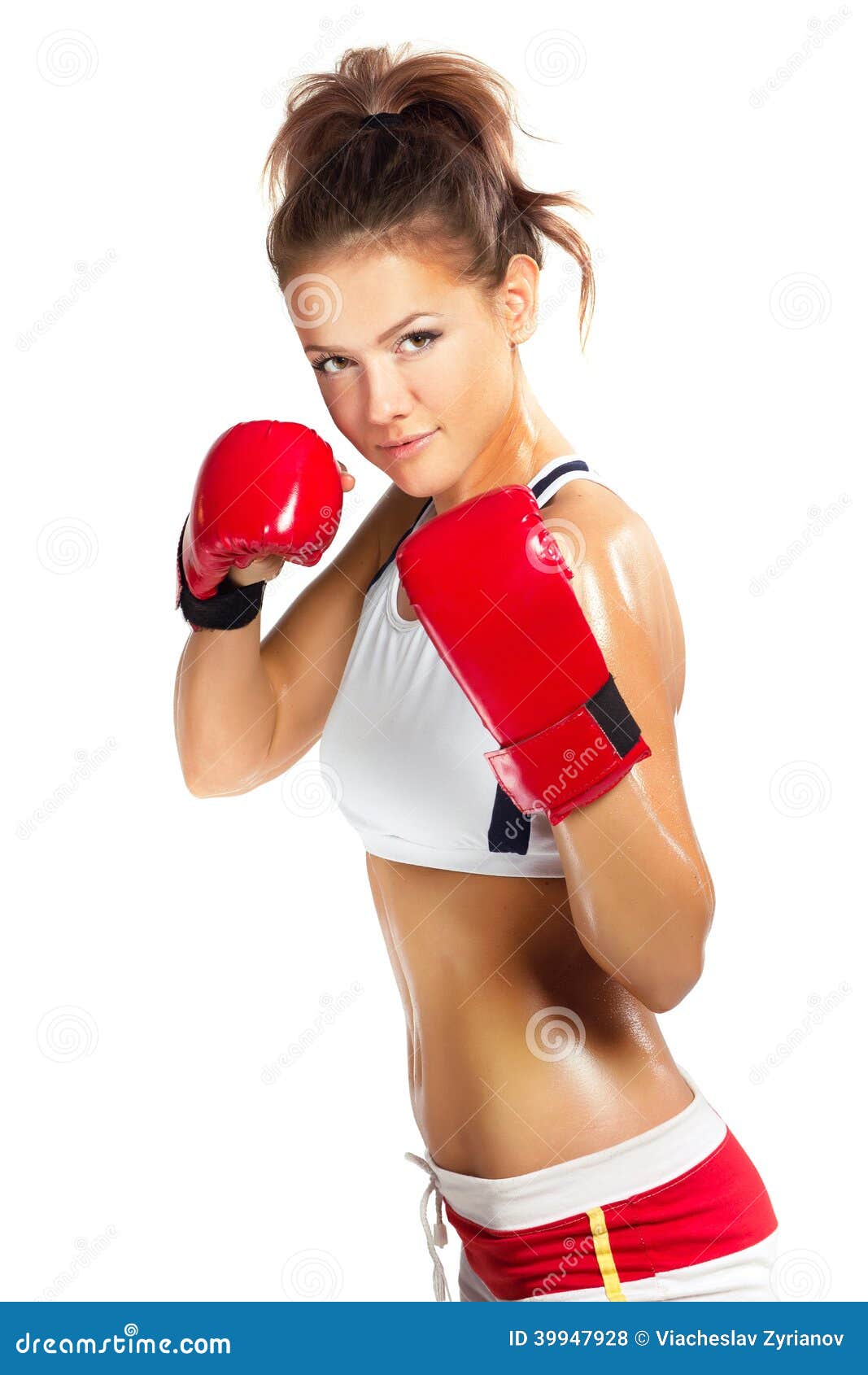 Una Mujer Boxeadora Con Un Chándal Rojo Golpea Un Saco De Boxeo. Fotos,  retratos, imágenes y fotografía de archivo libres de derecho. Image  200247997