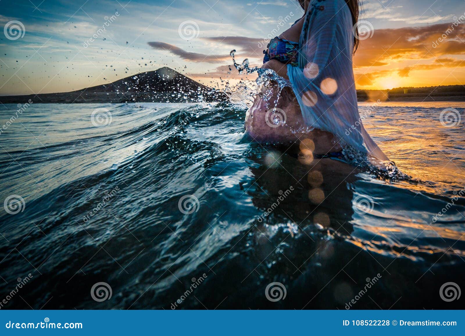 pregnant woman bathing in the sea