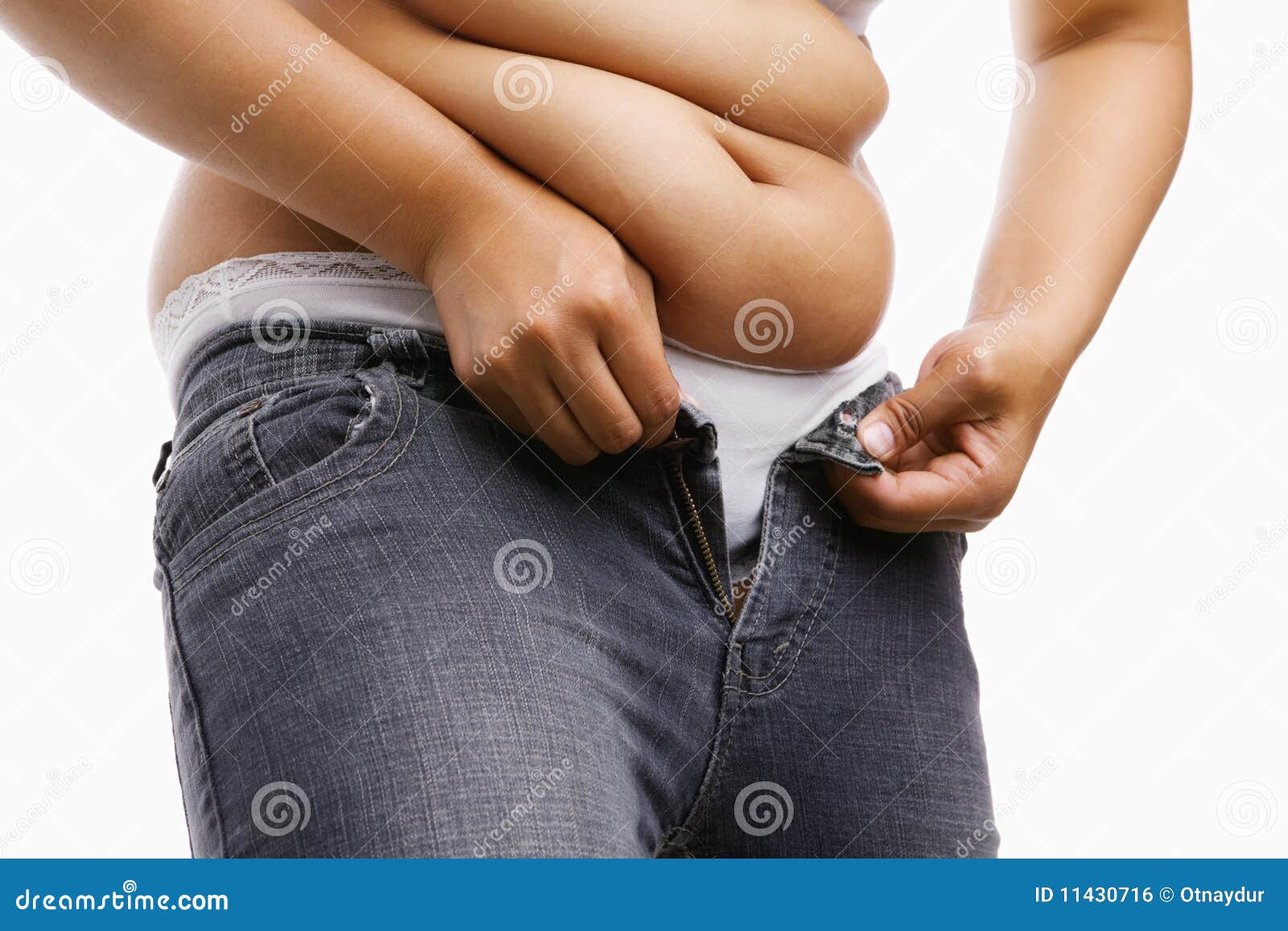 Mulher Gorda Que Tenta Põr Sobre Suas Calças De Brim Apertadas Foto de  Stock - Imagem de obeso, gordo: 11430716