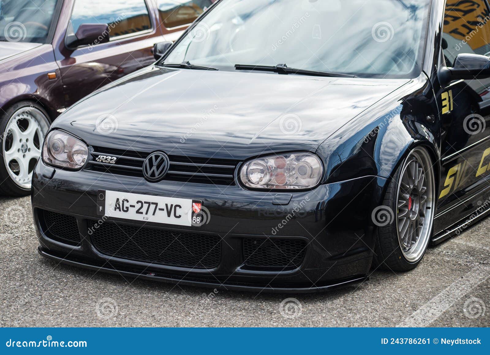 Front View of Black Volkswagen Golf 4 R32 Parked in the Street