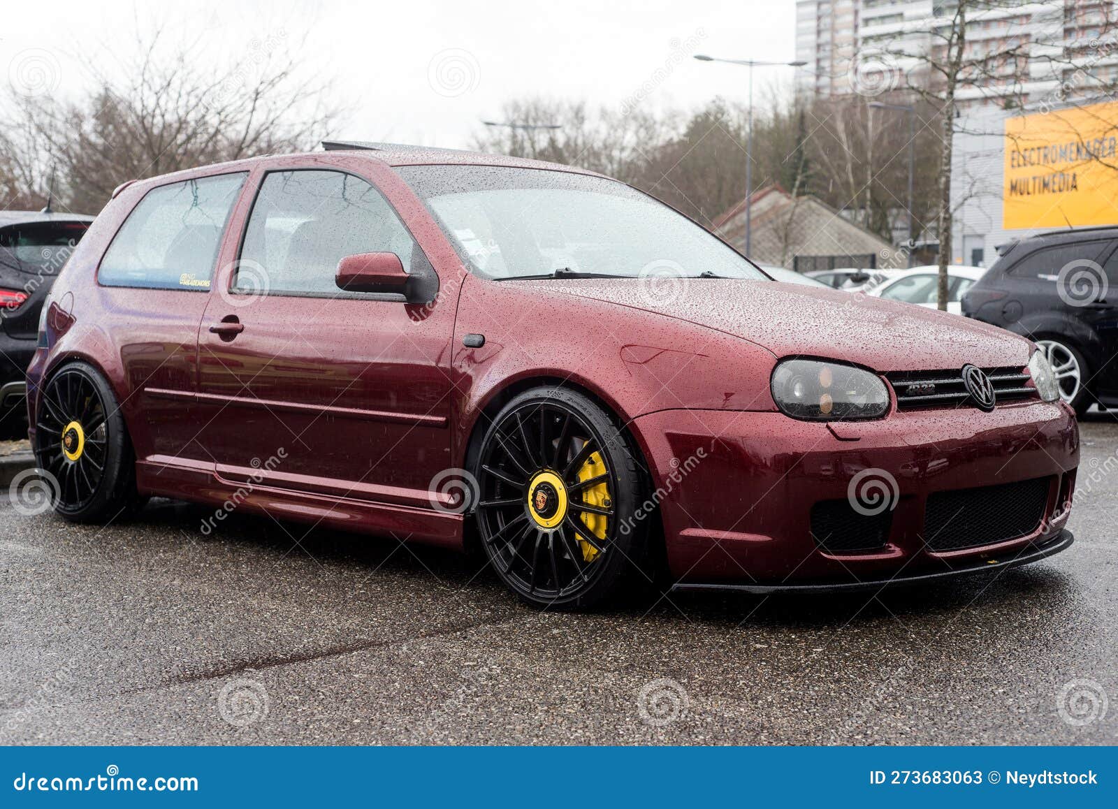 Front View of Red Volkswagen Golf 4 R32 Parked in the Streetby