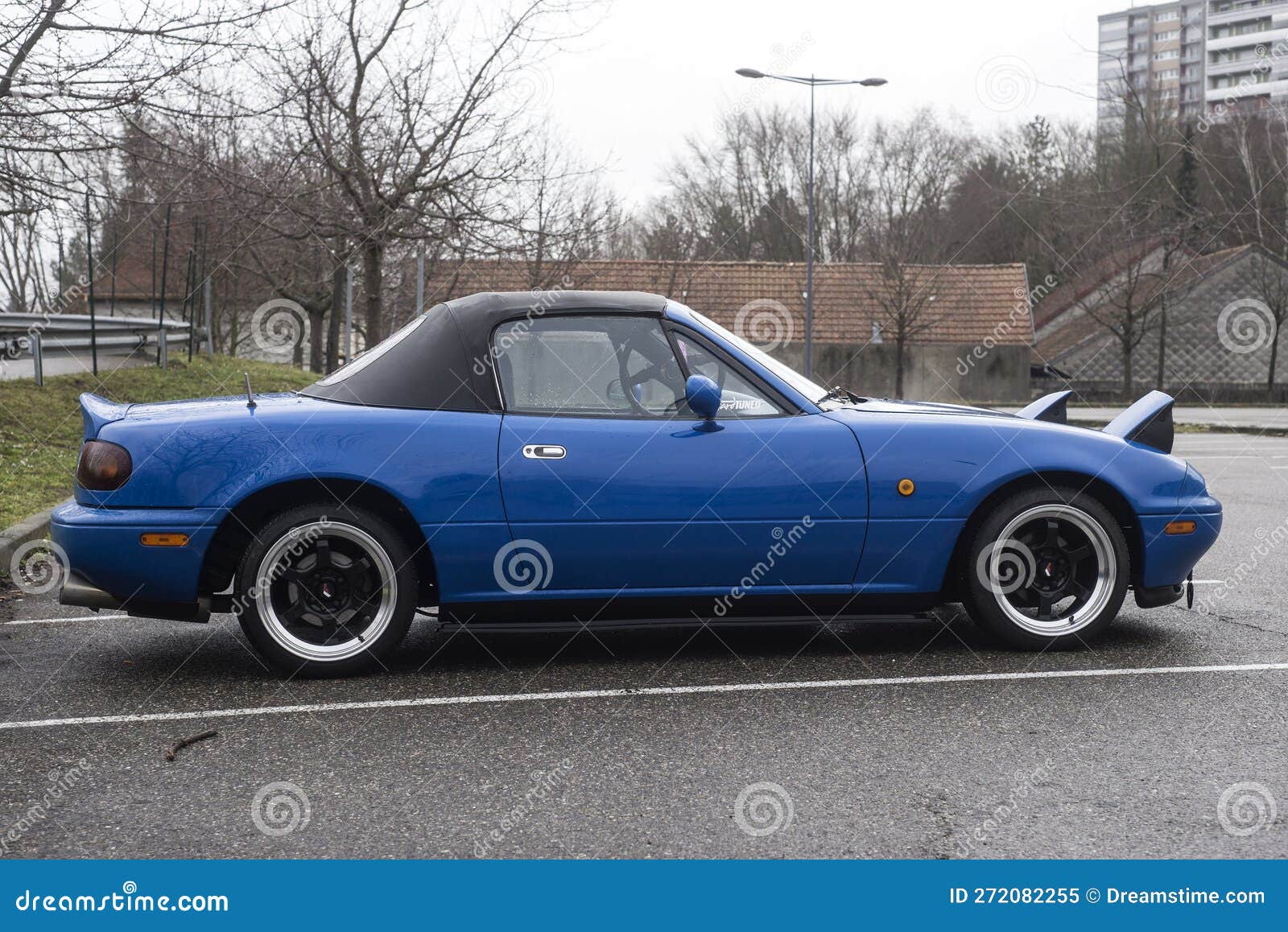 Profile View Of Blue Citroen Ami The Famous French Electric Car profile-view-of-blue-citroen-ami-the-famous-french-electric-car