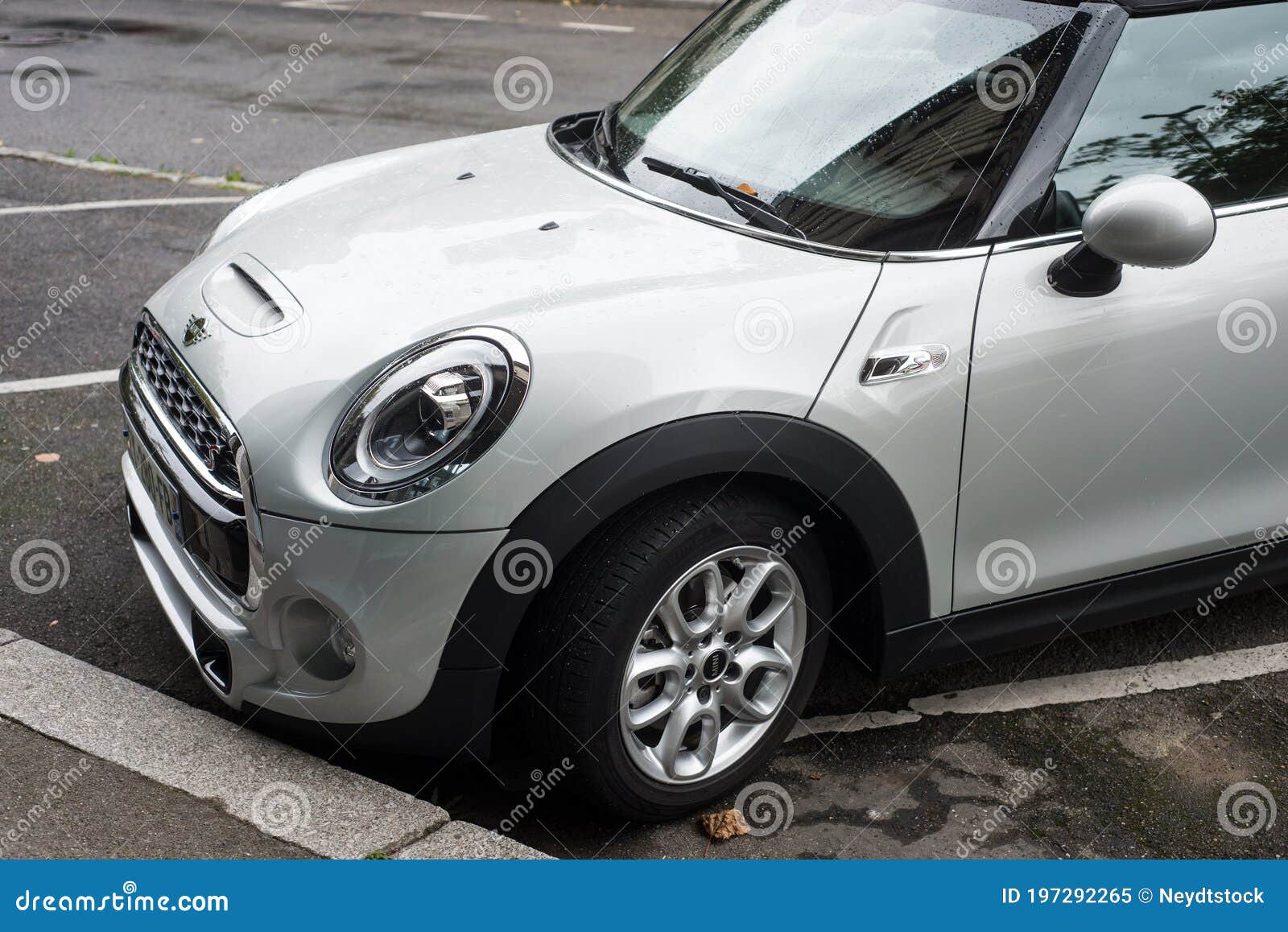 Front View of White Mini Cooper S Parked in the Street by Rainy Day ...