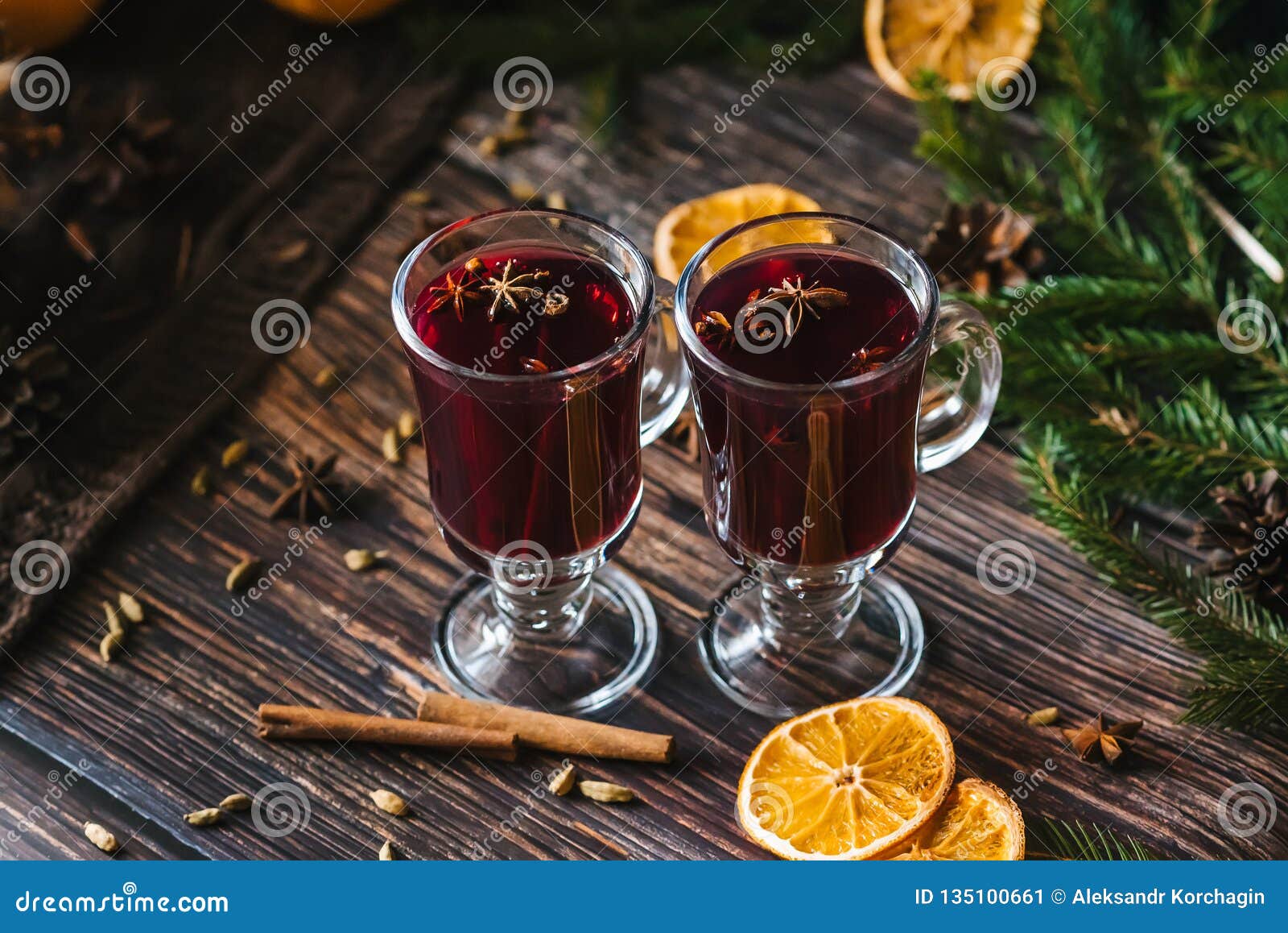 Mulled Wine in Glass Glasses with Orange Slices, Cinnamon Sticks and ...