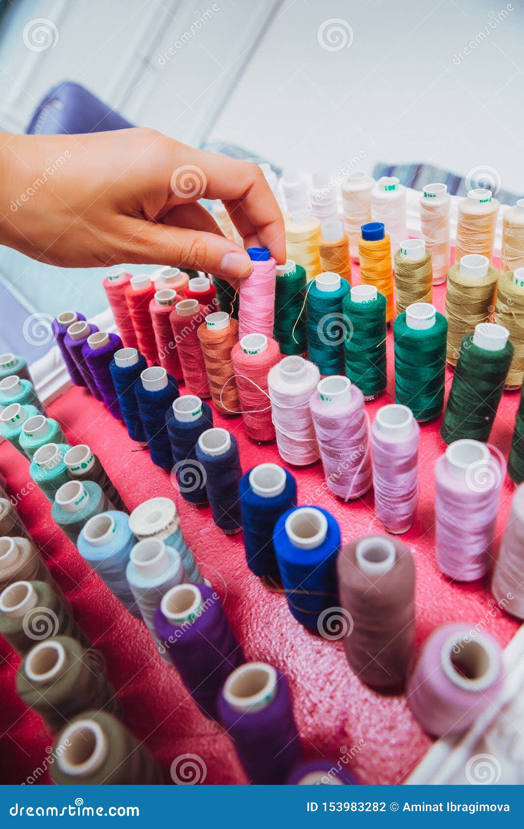 Multi Color Spools of Thread Needlework, Sewing, Tailoring and