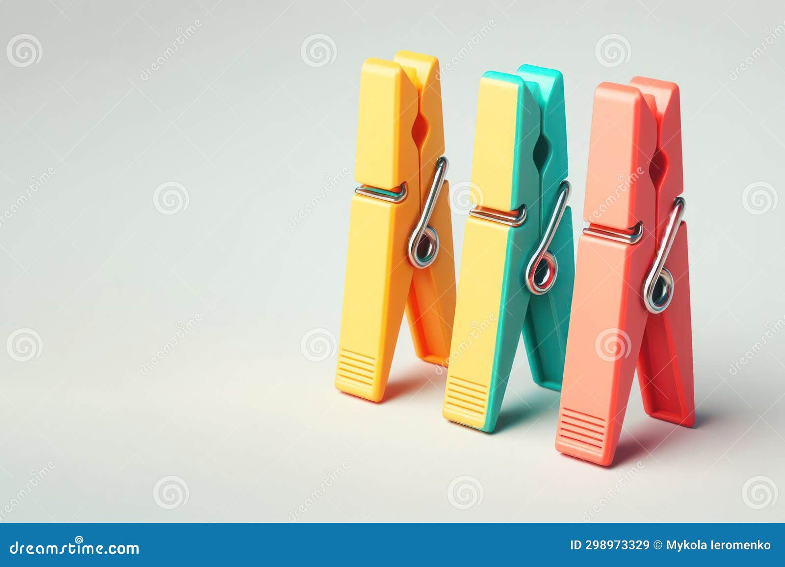 Small Clothespins of different colors close-up as a texture and