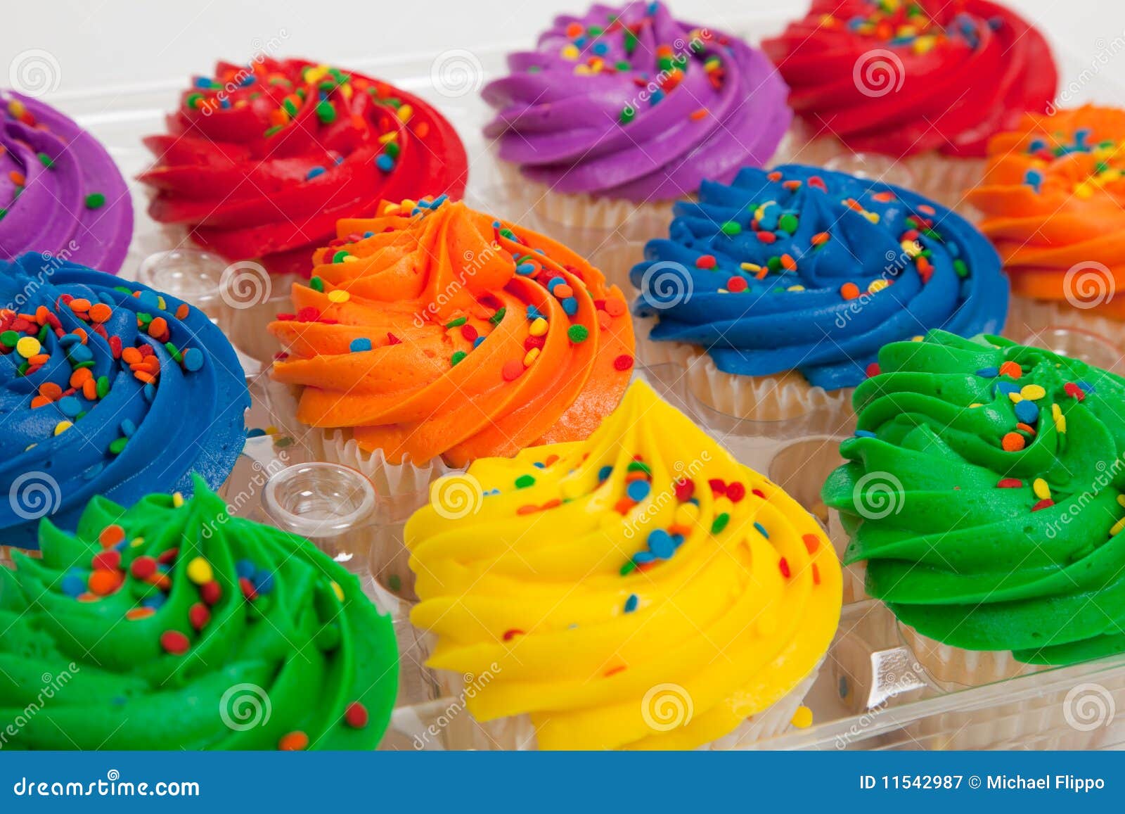 Multi-colored Cupcakes With Sprinkles Royalty Free Stock Photography