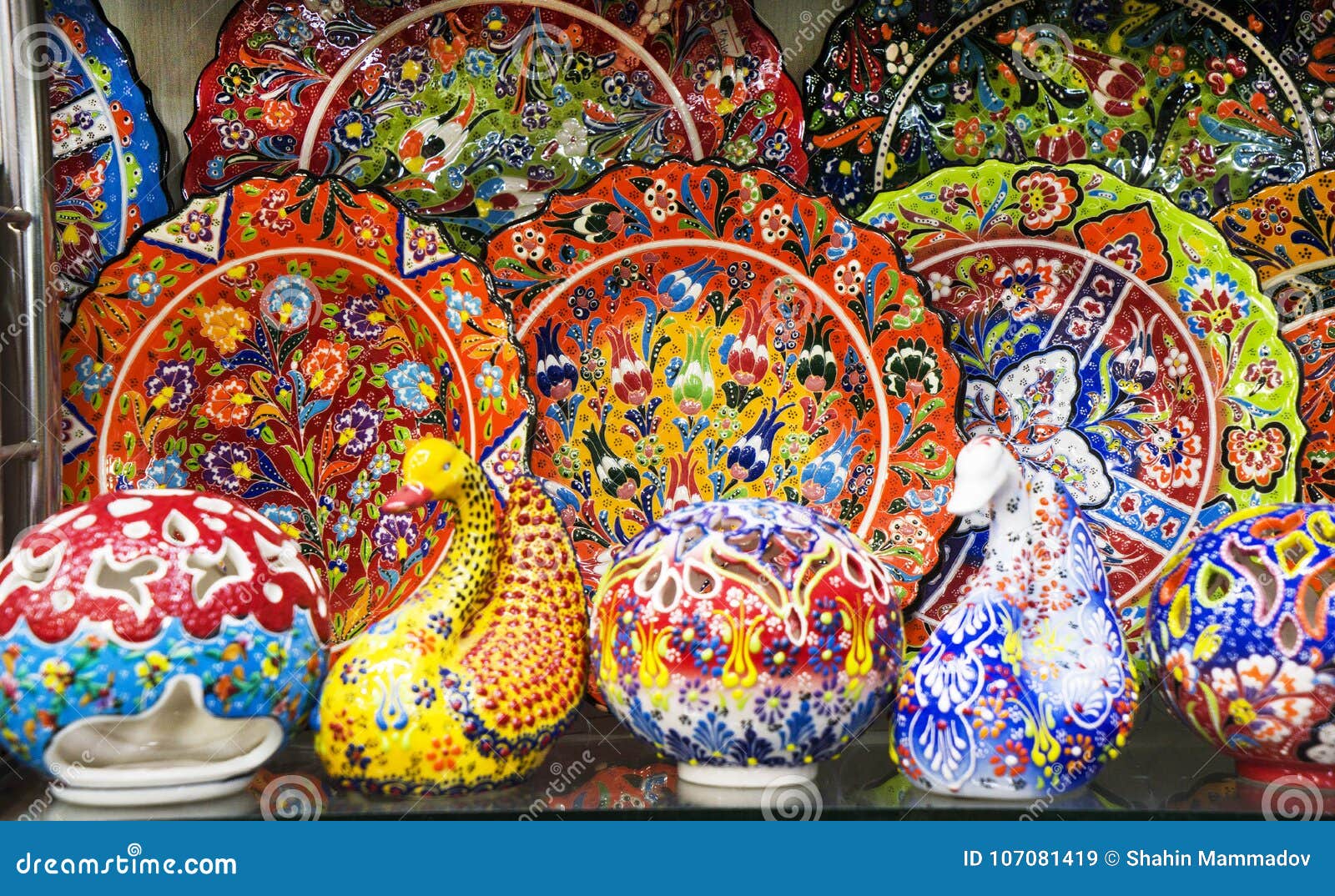 Multicolored Decorative Turkish Oriental Ornamental Ceramic Ware on the Shelves Editorial Stock