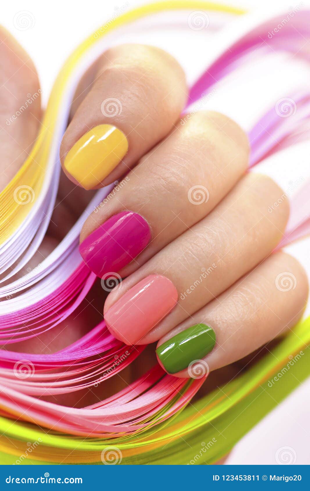 Multi-colored Manicure with Pink,green, Yellow and Peach Nail Polish ...