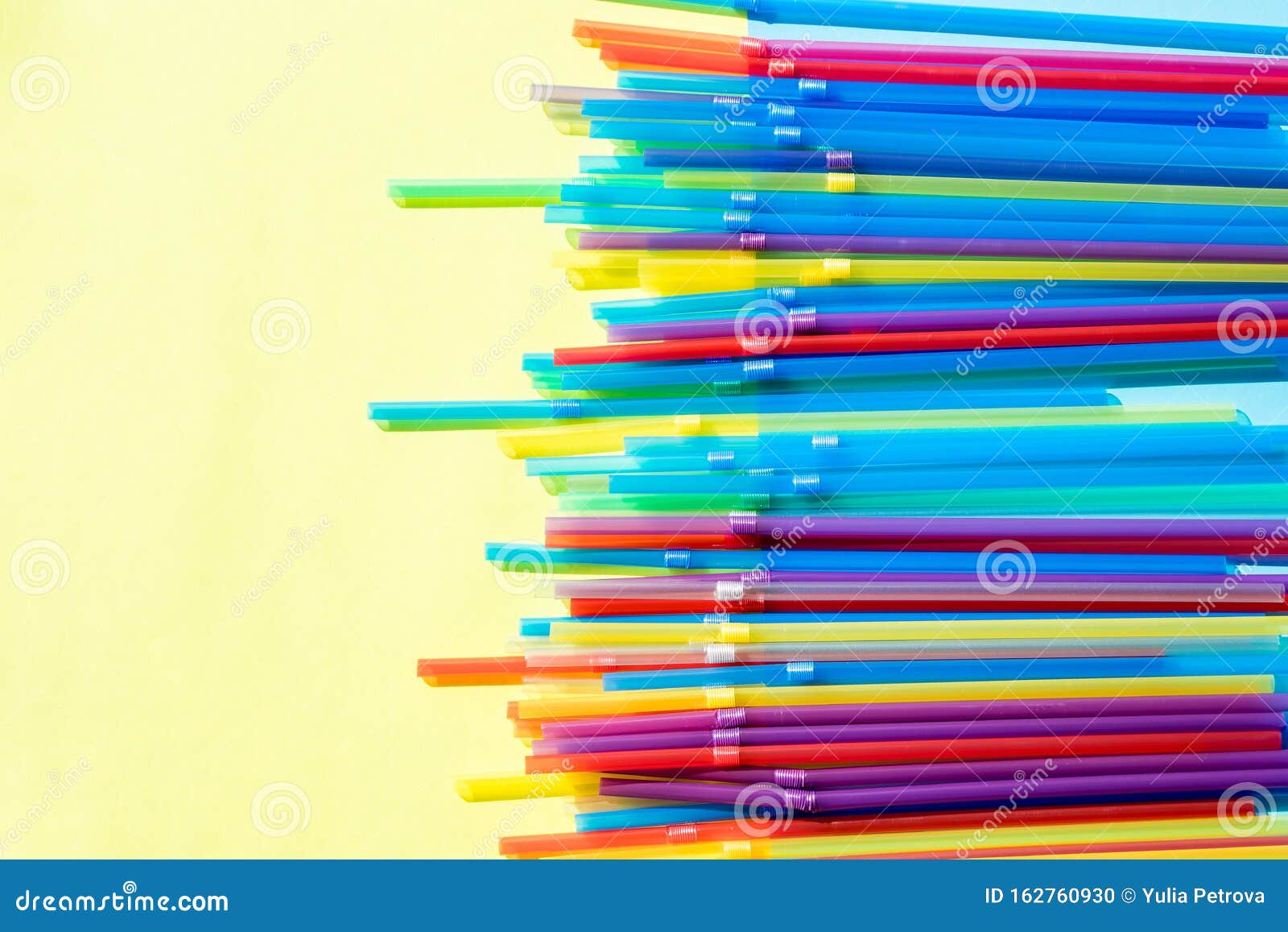 Multi Colored Plastic Drinking Straw on Pastel Background.plastic