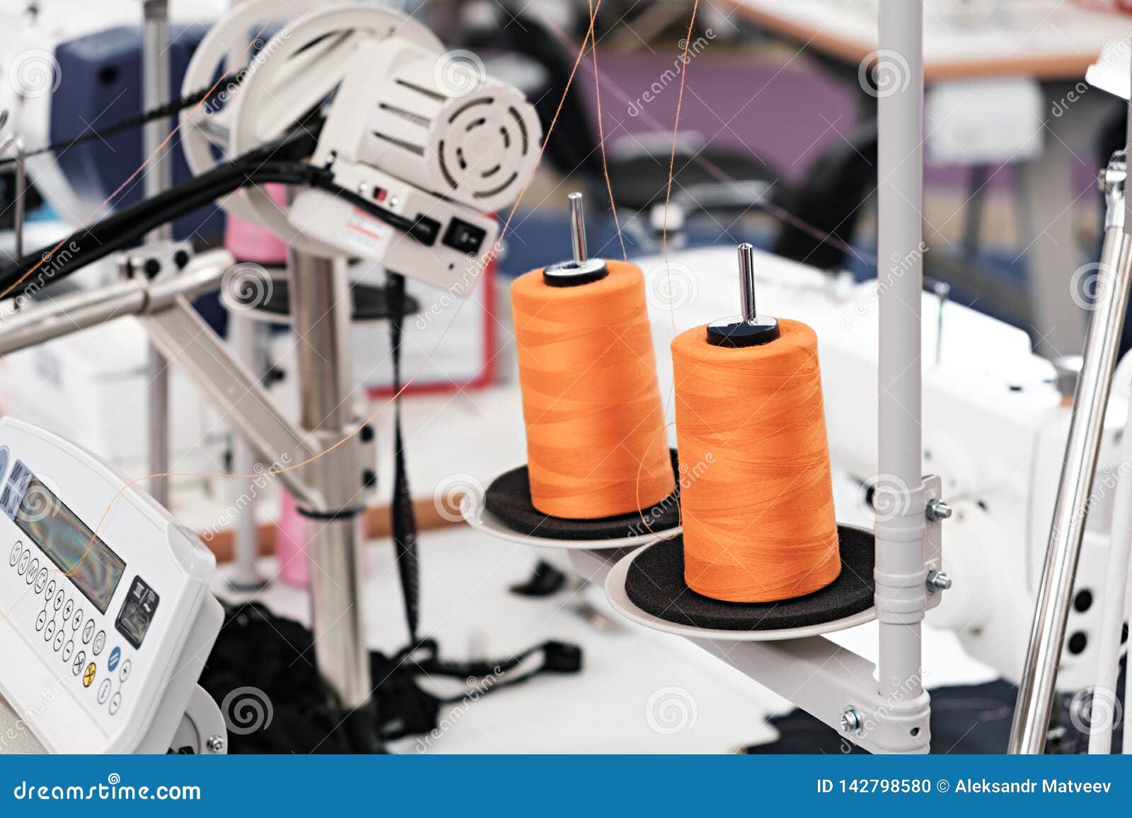 Multicolored Thread Embroidery Machines Stock Photo