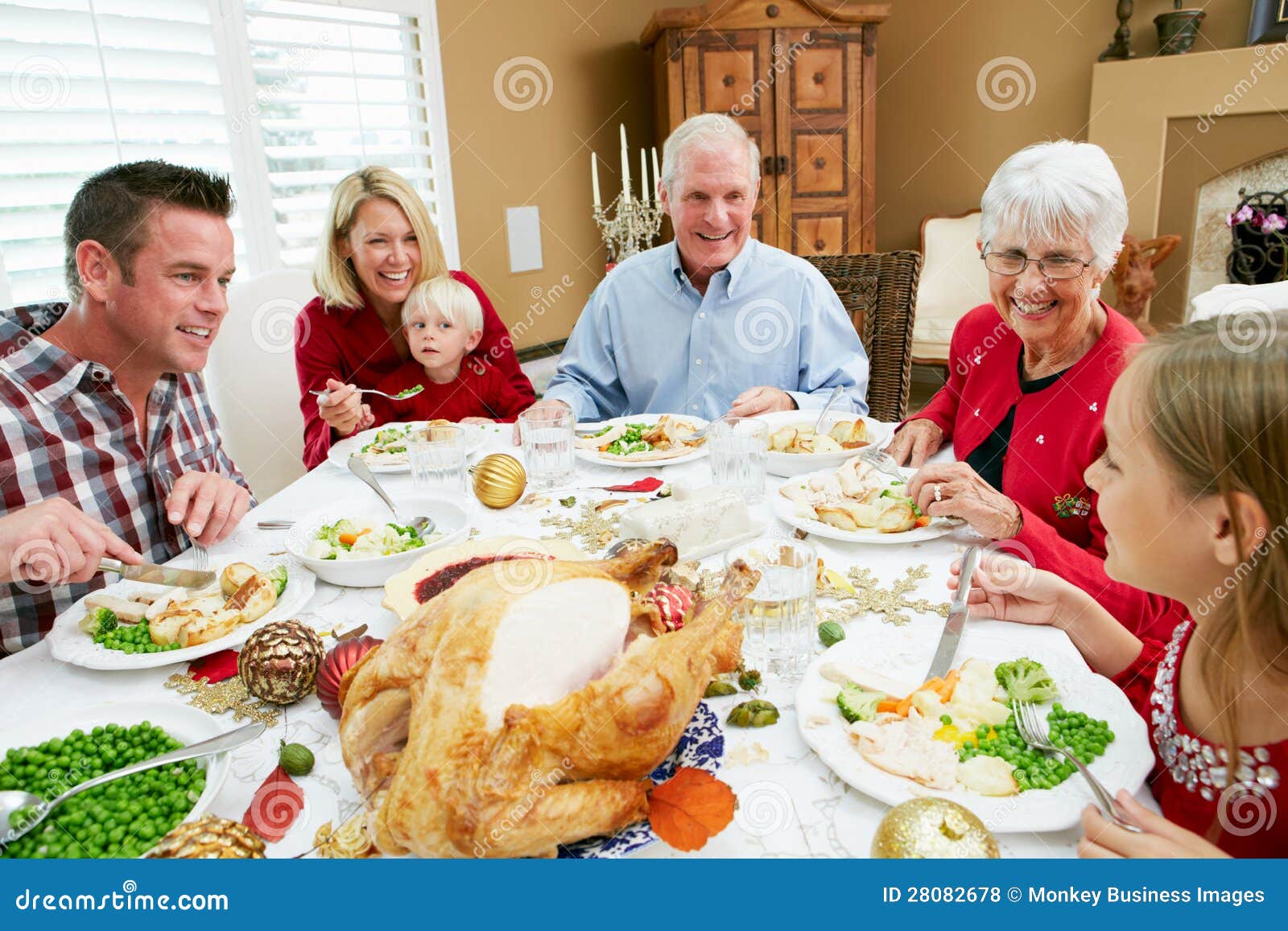 Multi Generation Family Having Christmas Meal Stock Photo - Image of ...