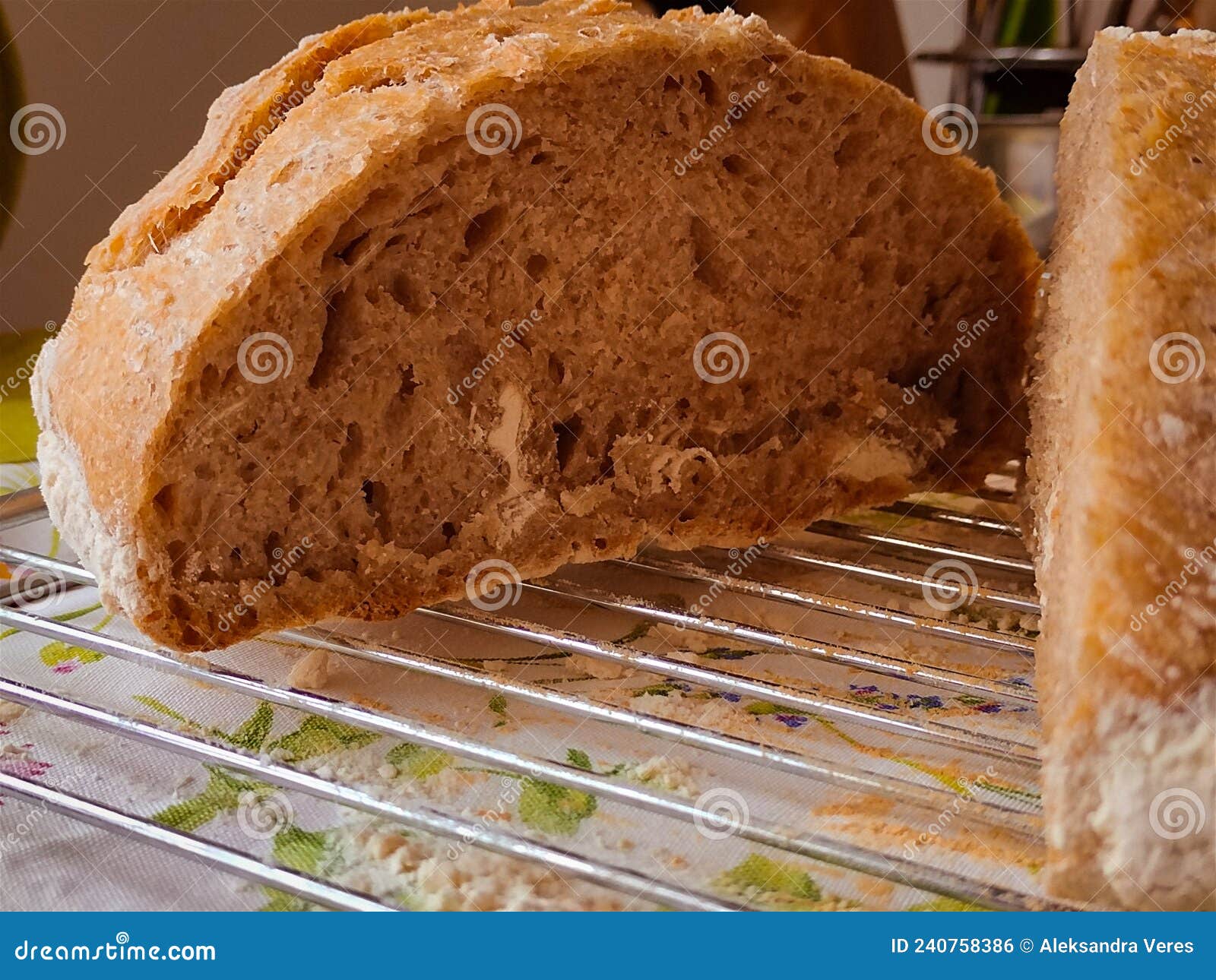 The Multi Grain Sourdough Bread in a Cut on the Cooling Rack Stock