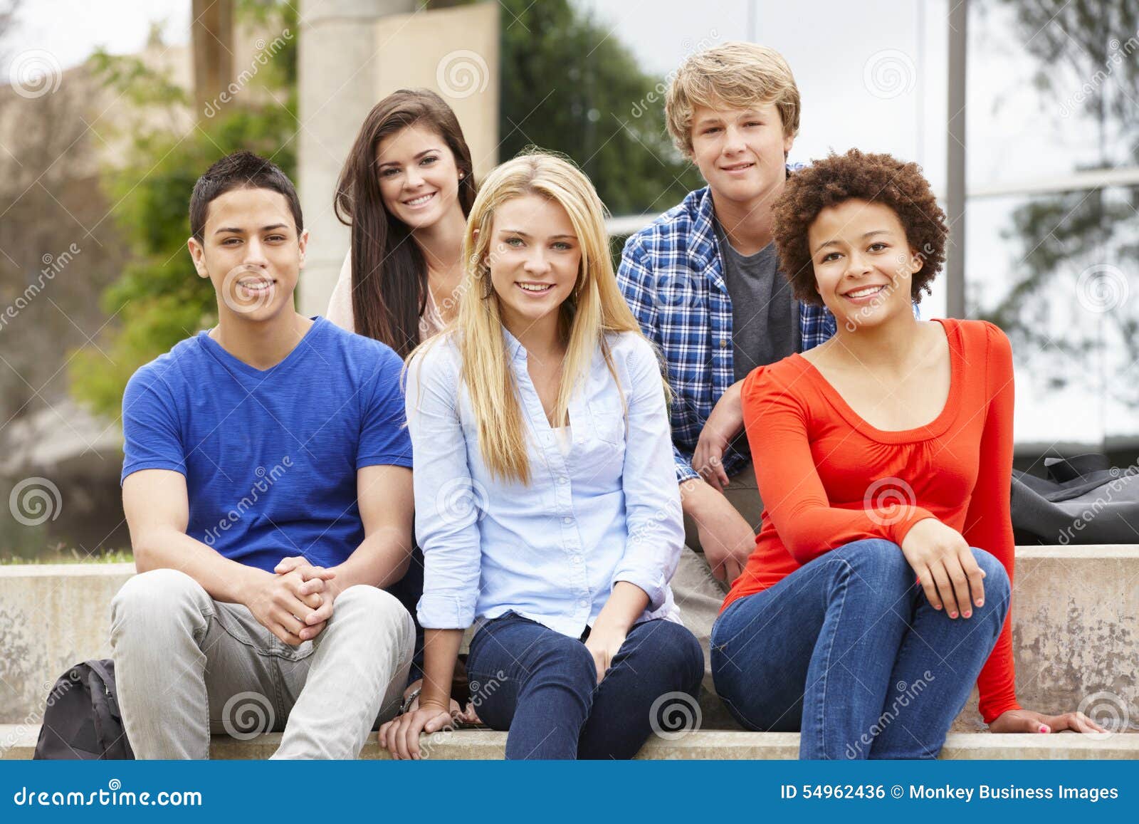 Multi Racial Student Group Sitting Outdoors Stock Photo - Image of ...