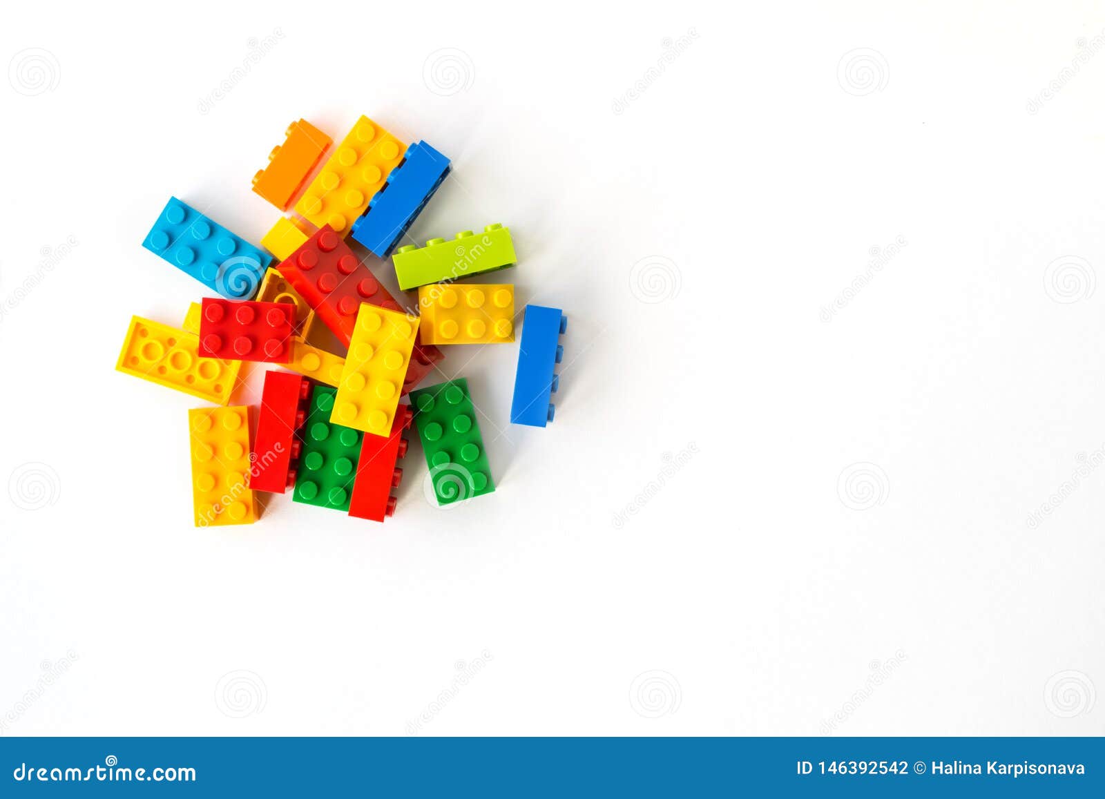 lego backround. multicolor plastick constructor bricks on white background. popular toys. copyspace
