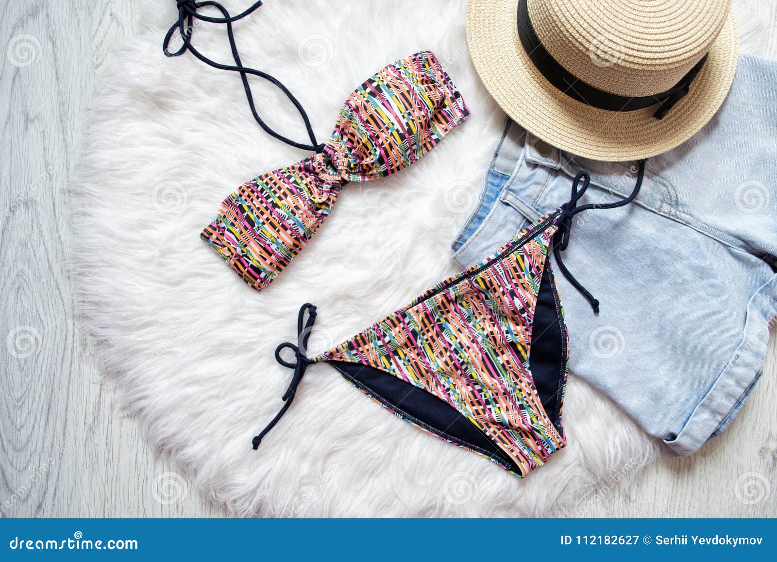 Multicolor Swimsuit, Straw Hat and Denim Shorts. White Fur on Th Stock ...