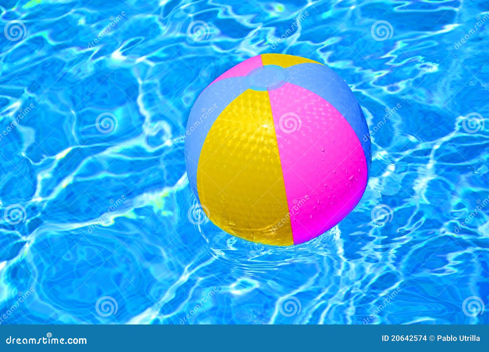 Multicolored Beach Ball In Swimming Pool Stock Photo ...