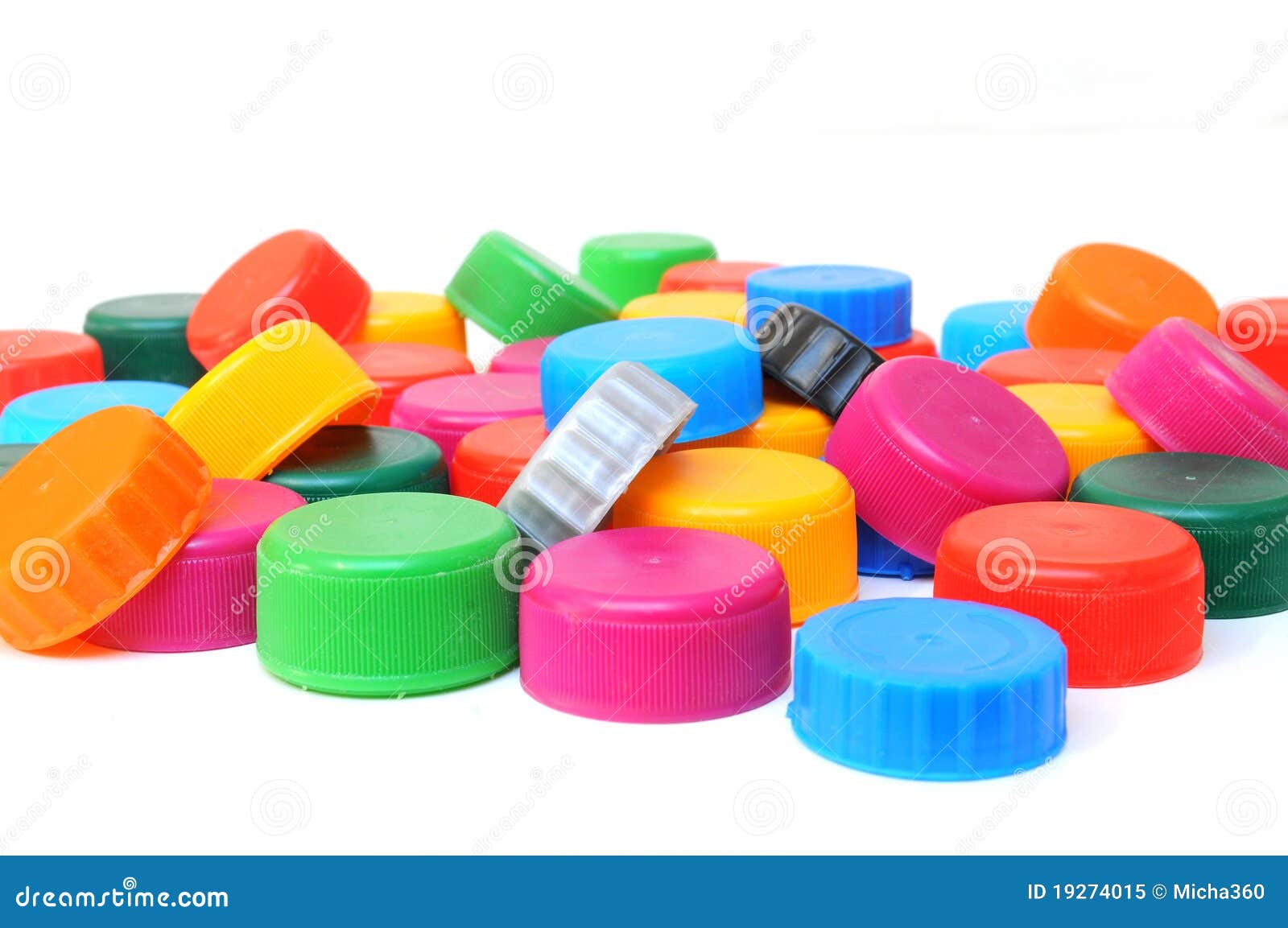Plastic Bottle Caps In Different Colours. A Pile Of Plastic Bottle Covers.  Isolated On White Background. Stock Photo, Picture and Royalty Free Image.  Image 81597458.