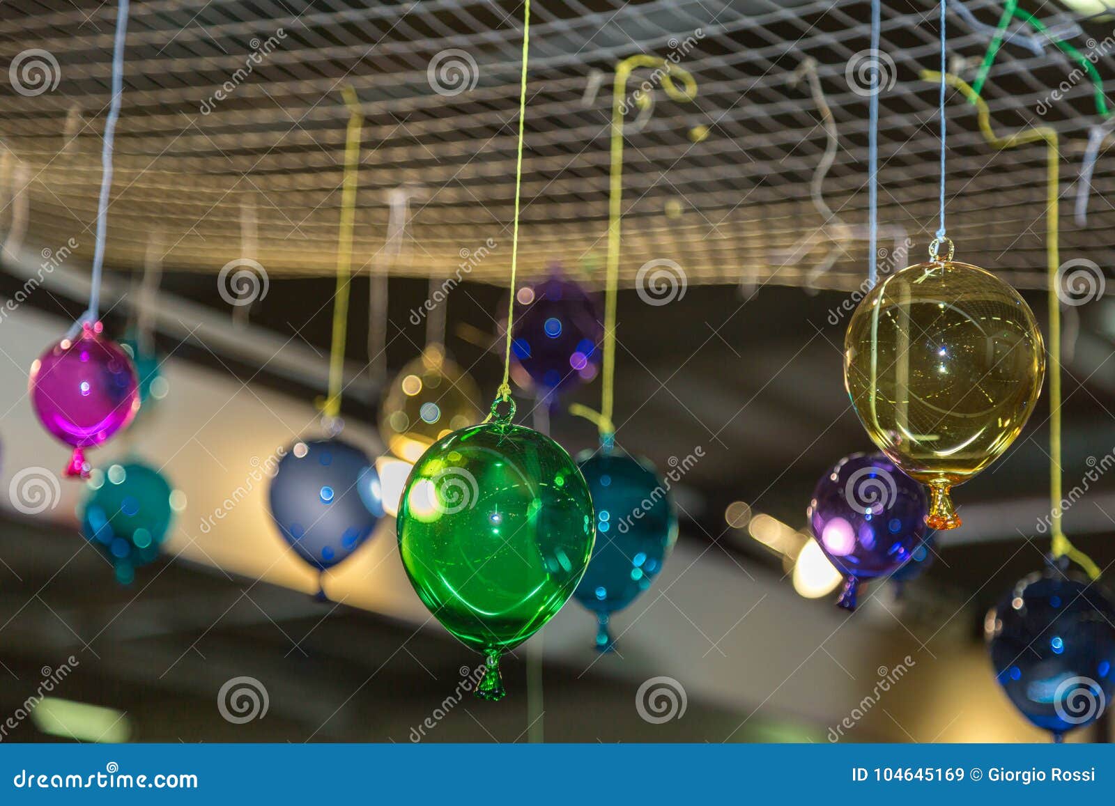 Multicolored Glass Balloons Hanging From The Ceiling Stock Image
