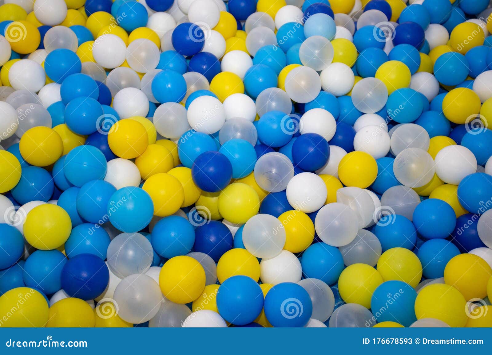 Multicolored Plastic Balls Yellow, Blue and Clear Stock Image Image