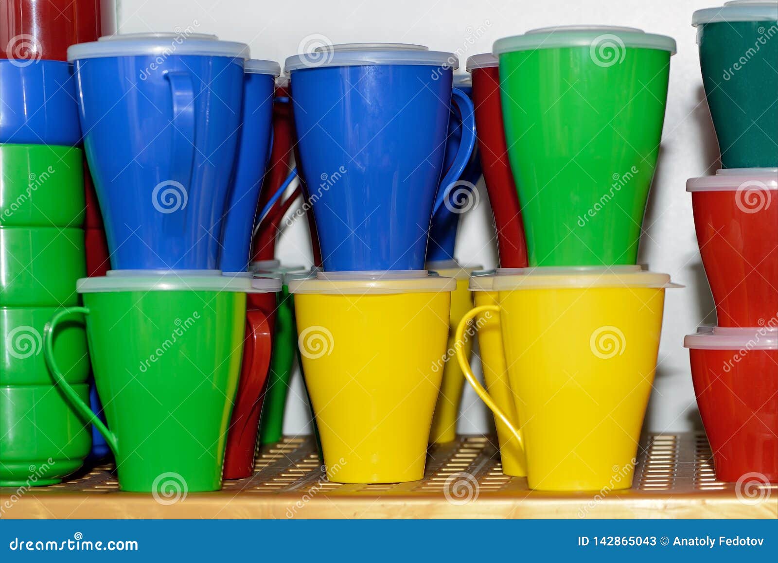 Multicolored Plastic Cups, Trays. Plastic Color Disposable Tableware