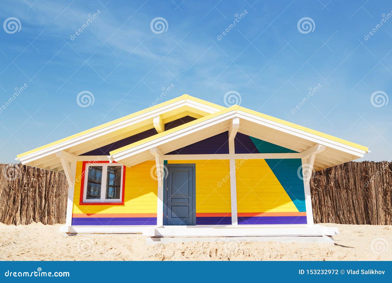 Multicolored Wooden House on the Beach Used for Resting Stock Photo