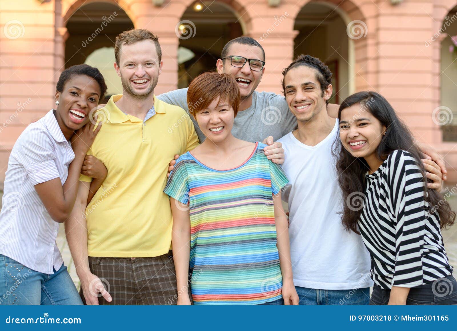 multicultural-group-people-posing-portrait-happy-outdoor-97003218.jpg
