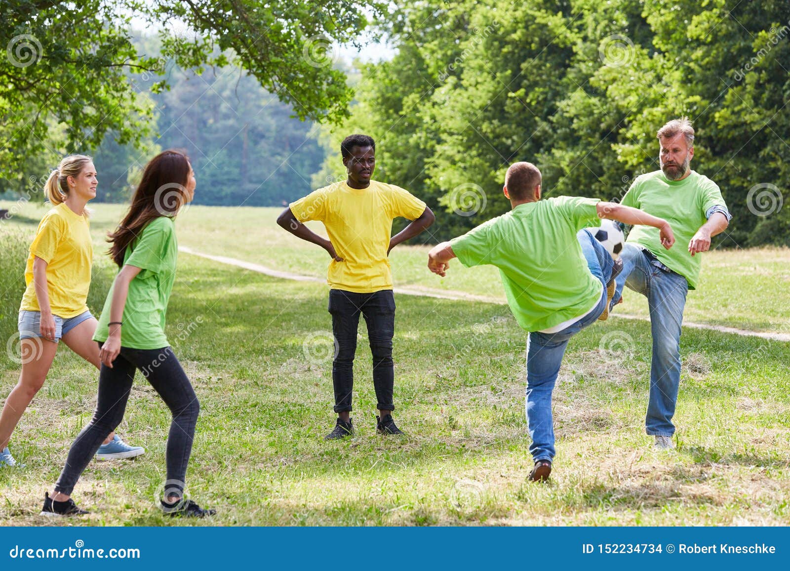 Multicultural Team is Playing Soccer in the Park Stock Photo - Image of ...
