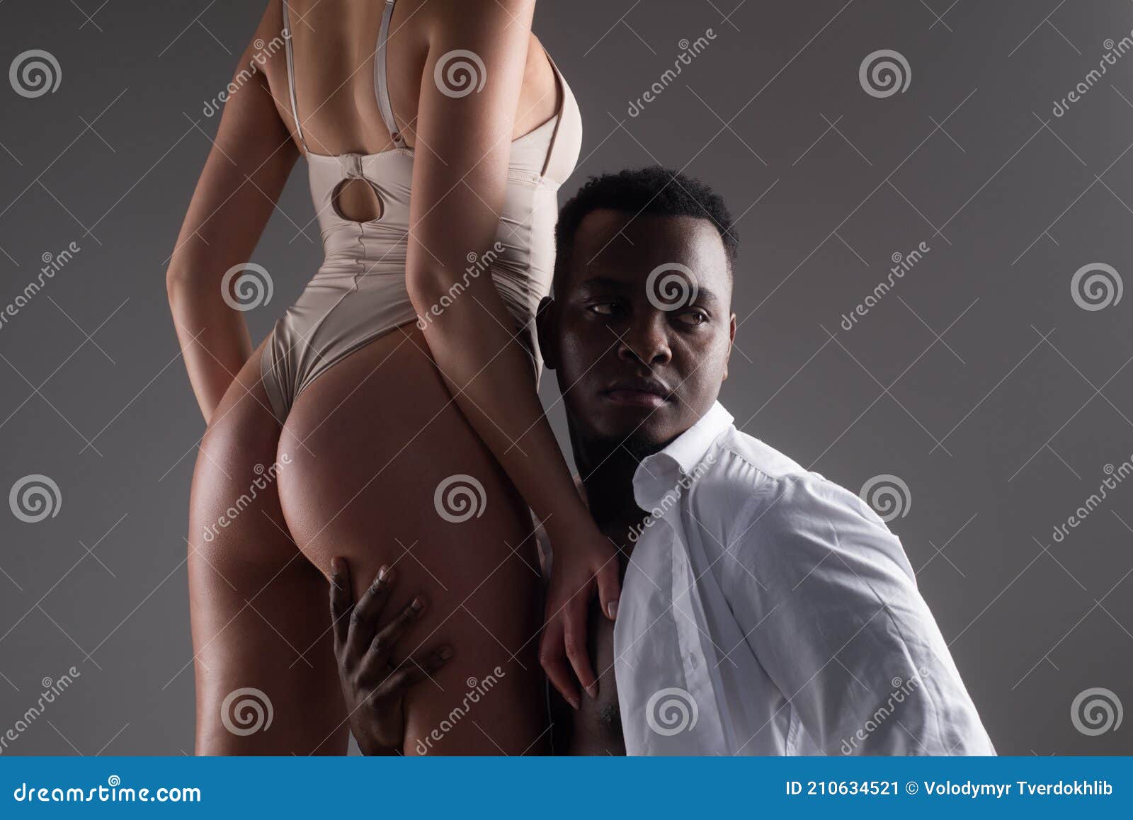 Multiethnic Couple. Interracial Sex. Passionately Embracing. Love photo image