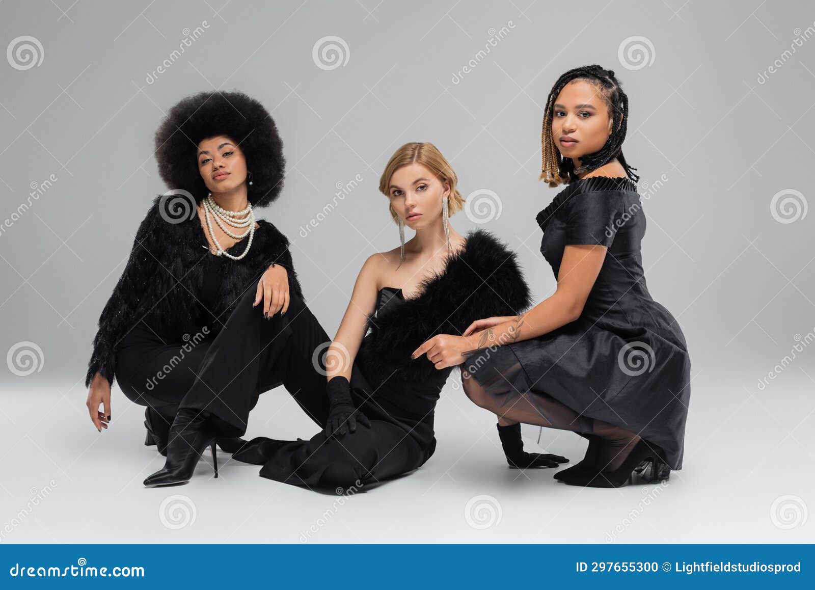 multiethnic fashionistas in black elegant wear