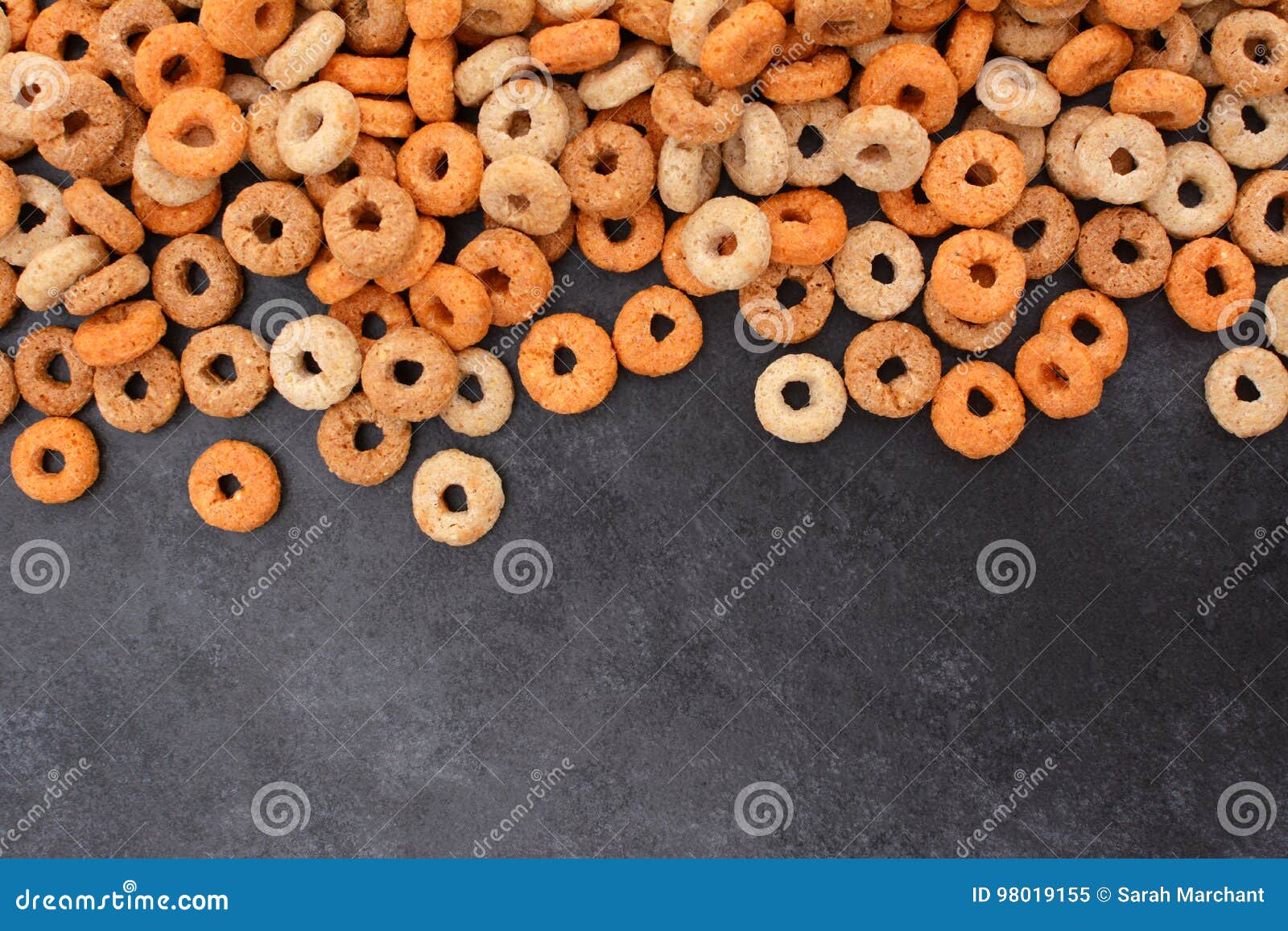 Multigrain Hoops Breakfast Cereal Border On Dark Grey Slate Stock Image