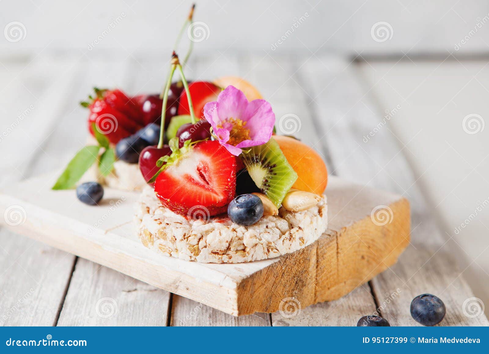 Multigrain Rice Cakes with Berries, Fruit and Almond for Healthy Stock