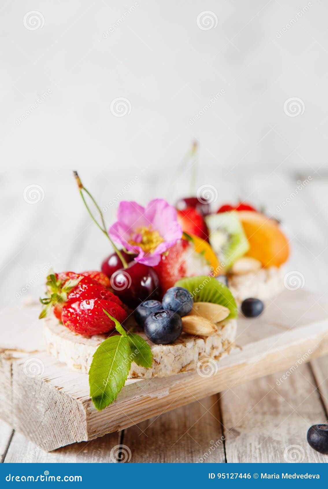 Multigrain Rice Cakes with Berries, Fruit and Almond for Healthy Stock